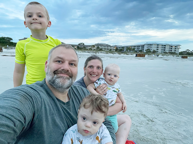 Jeremie Smith and Maggie Wetzel with their children, Isaac, Rowan and Luke