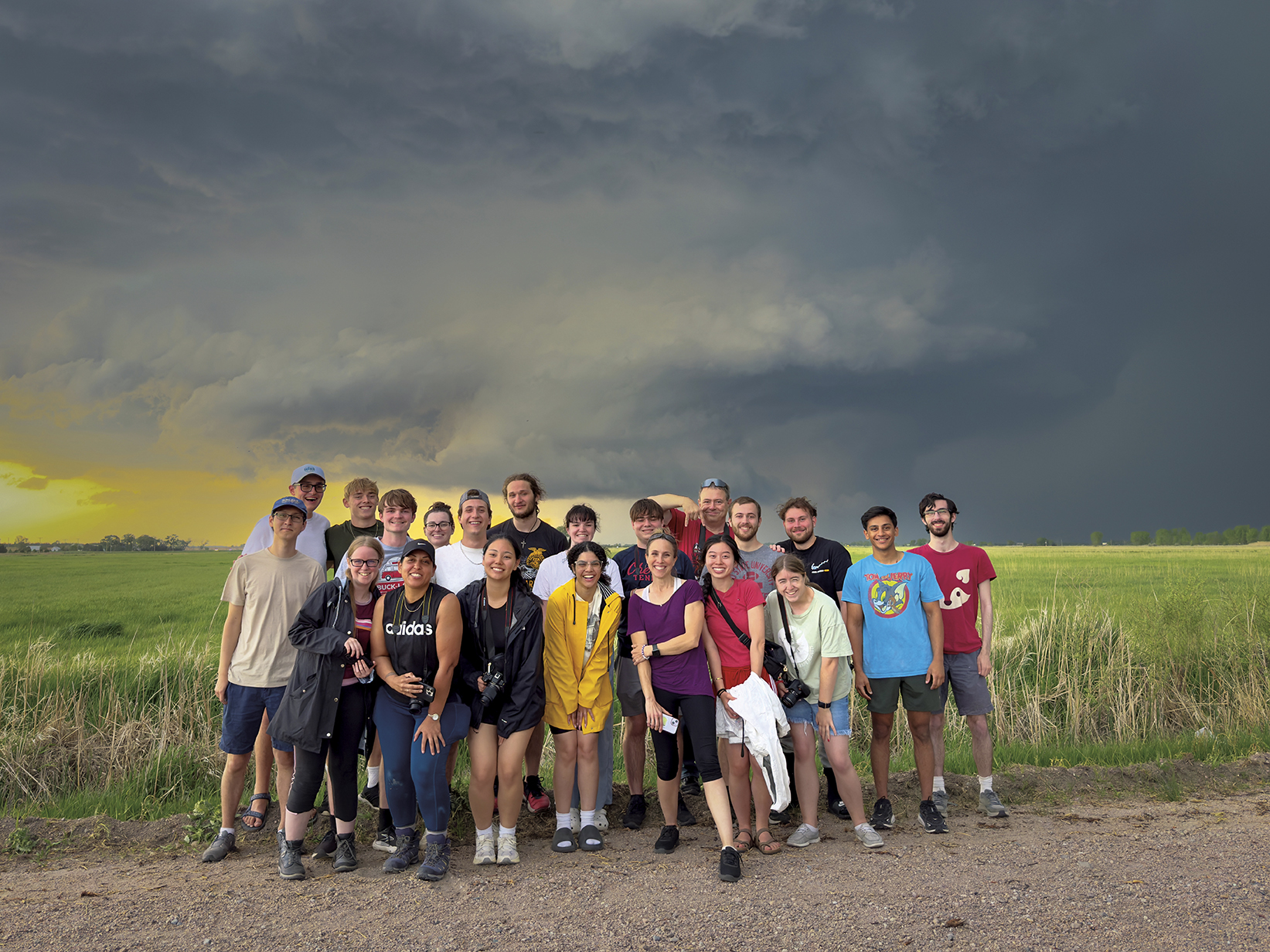 The spring 2025 GEOG 5701 cohort of students in front of a supercell near North Platte, Nebraska, on May 14, 2025.