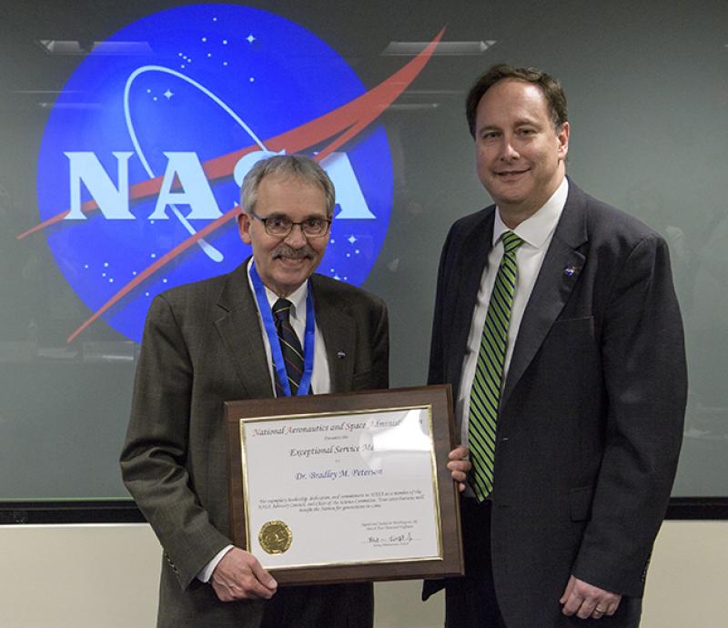 Bradley Peterson, left, and Robert Lightfoot, acting administrator of NASA. Bradley Peterson, left, and Robert Lightfoot, acting administrator of NASA.