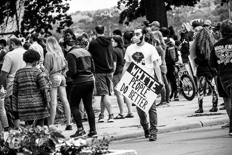 White protester with a sign at a Black Lives Matter protest in Mansfield in May 2020