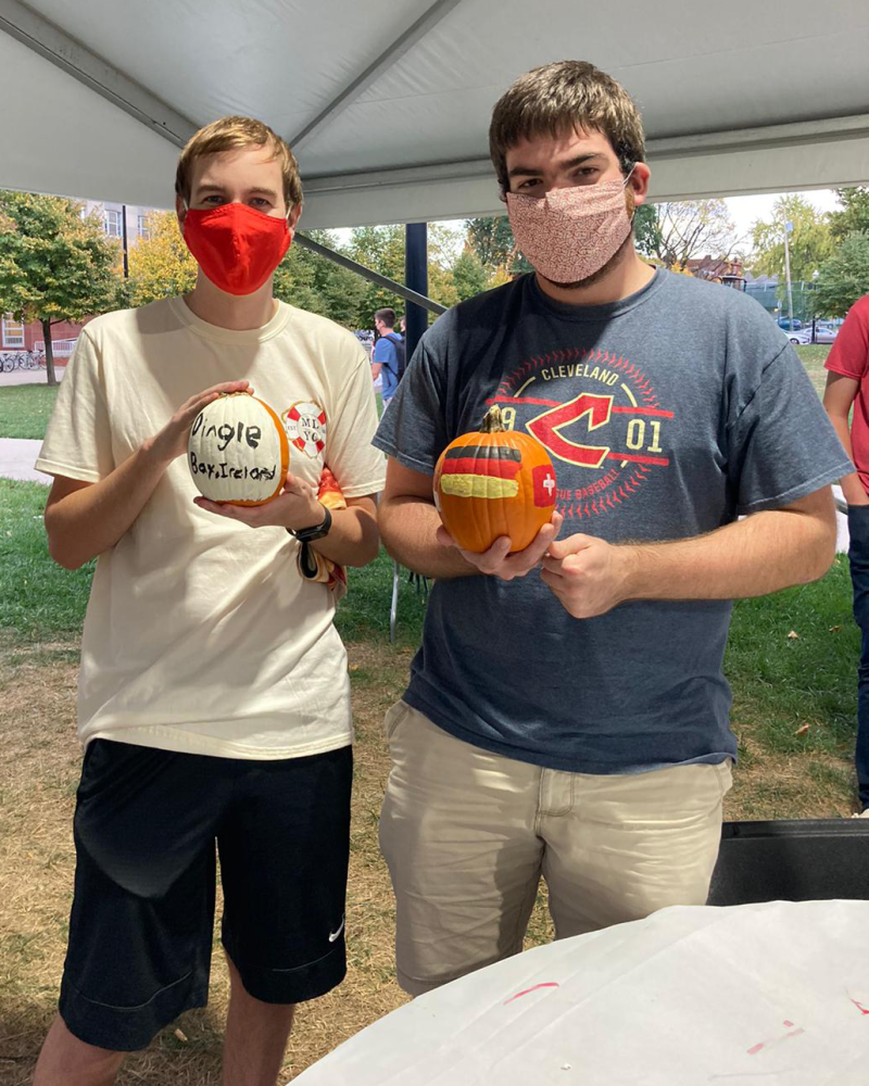 German Club members paint pumpkins