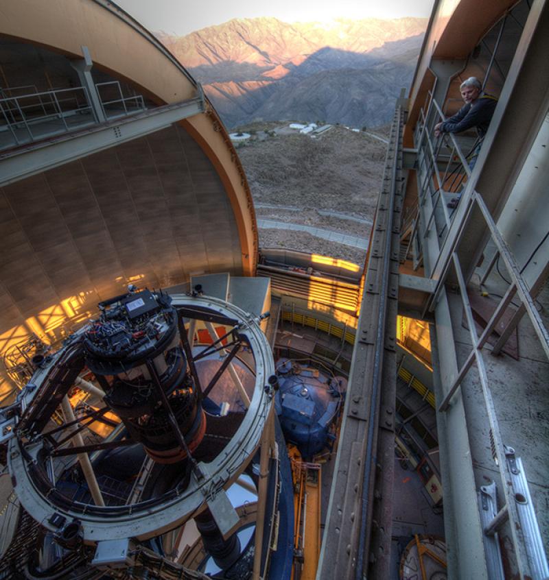 The Blanco telescope, where the Dark Energy Camera is mounted. Physics Professor Klaus Honscheid in the dome of the telescope where the Dark Energy Camera is mounted (T. Abbott, CTIO)