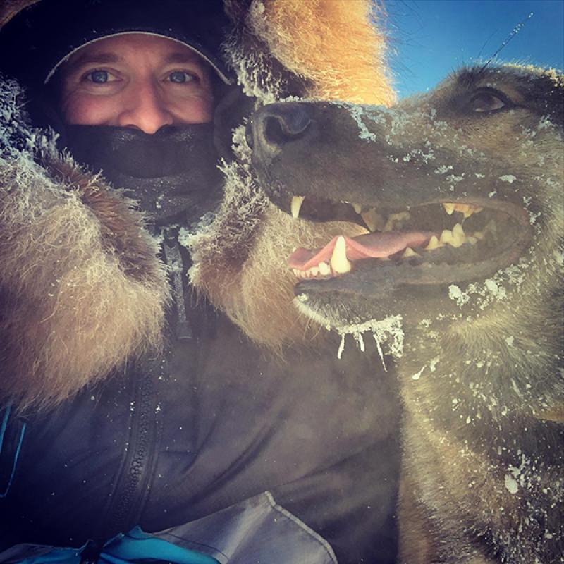 Matthew Failor out on a trail with his dogs.