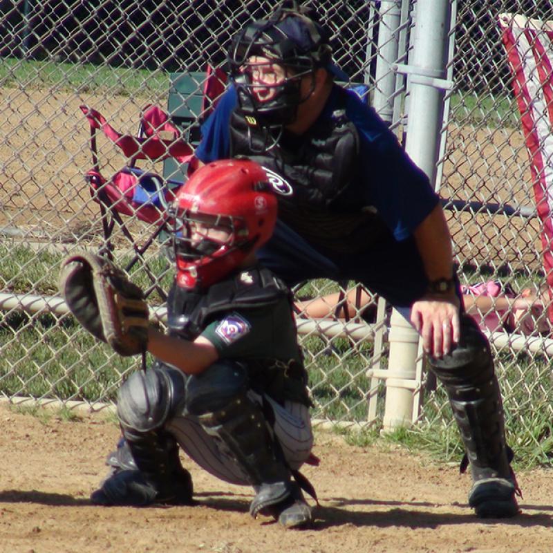 Christopher Lewis playing baseball