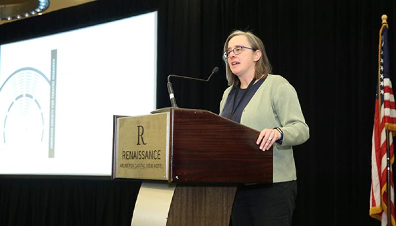 EJ Westlake speaking at a lectern