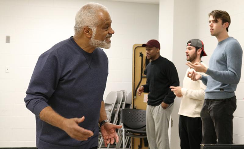 "Red Velvet" guest director Ted Lange leads the production's cast in warmups before rehearsal. "Red Velvet" guest director Ted Lange leads the production's cast in warmups before rehearsal.