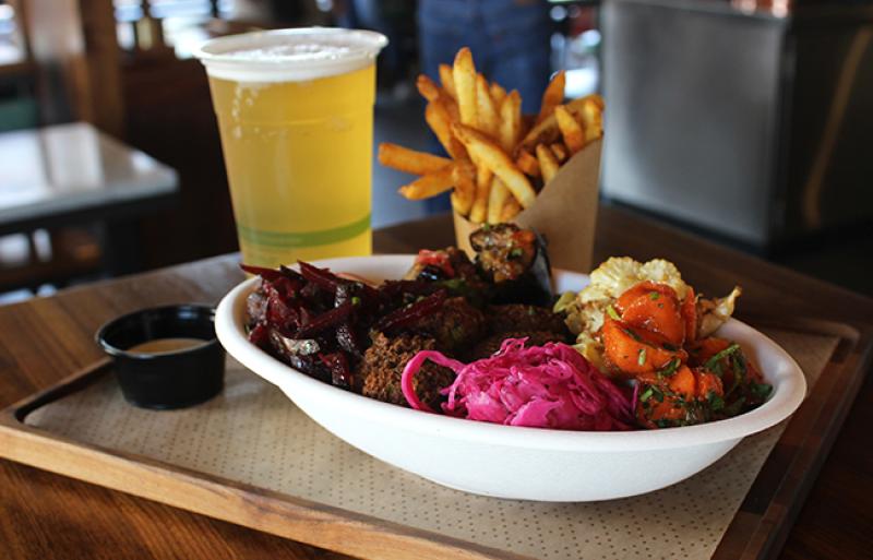 Brassica's menu includes falafel, chicken shawarma and brisket that can be put in a pita sandwich or atop a bed of salad greens and lentils. Brassica's menu includes falafel, chicken shawarma and brisket that can be put in a pita sandwich or atop a bed of salad greens and lentils.