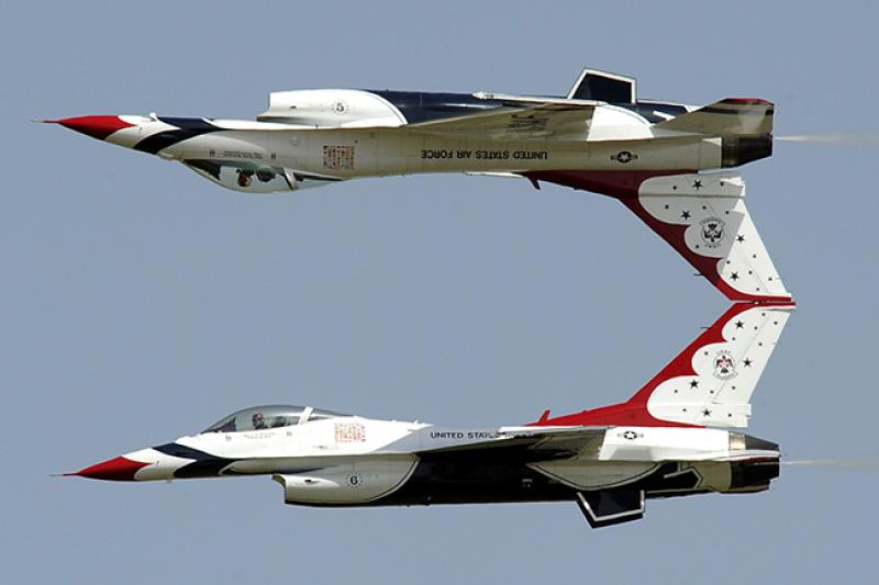 Thunderbirds No. 5 and 6 perform the calypso maneuver. Photo credit U.S. Air Force. Thunderbirds No. 5 and 6 perform the calypso maneuver. Photo credit U.S. Air Force.