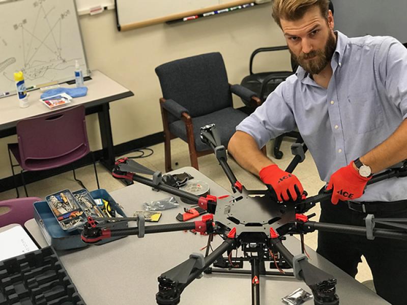 Schoessow works on the RANGER System drone. Schoessow works on the RANGER System drone.
