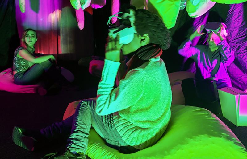 Viewers experience "Un-becoming Carbon," a multimedia art installation demonstrating the importance of plants. Viewers experience "Un-becoming Carbon," a multimedia art installation demonstrating the importance of plants.