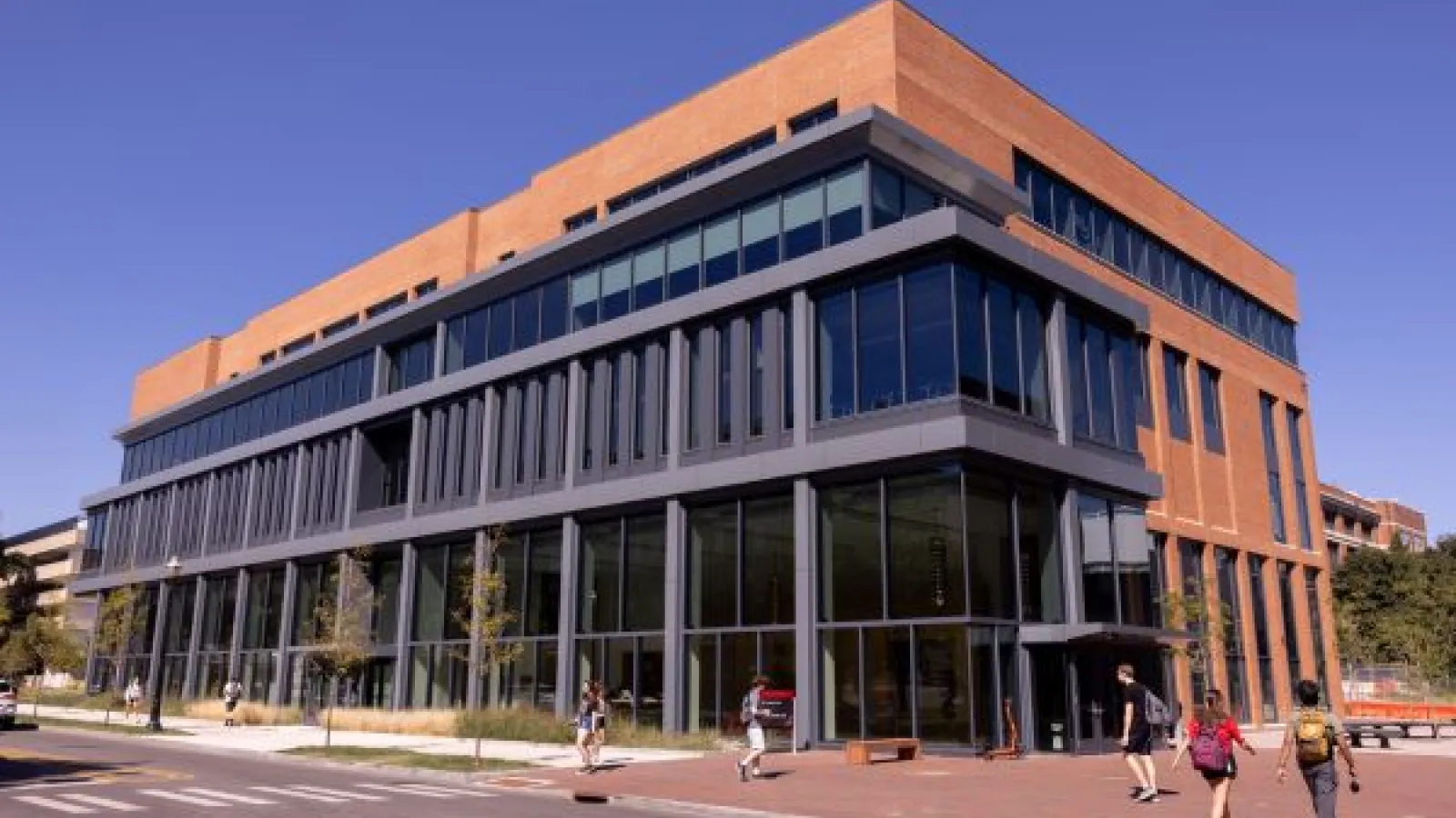 Theatre Film and Media Arts Building, a modern brick building with large windows