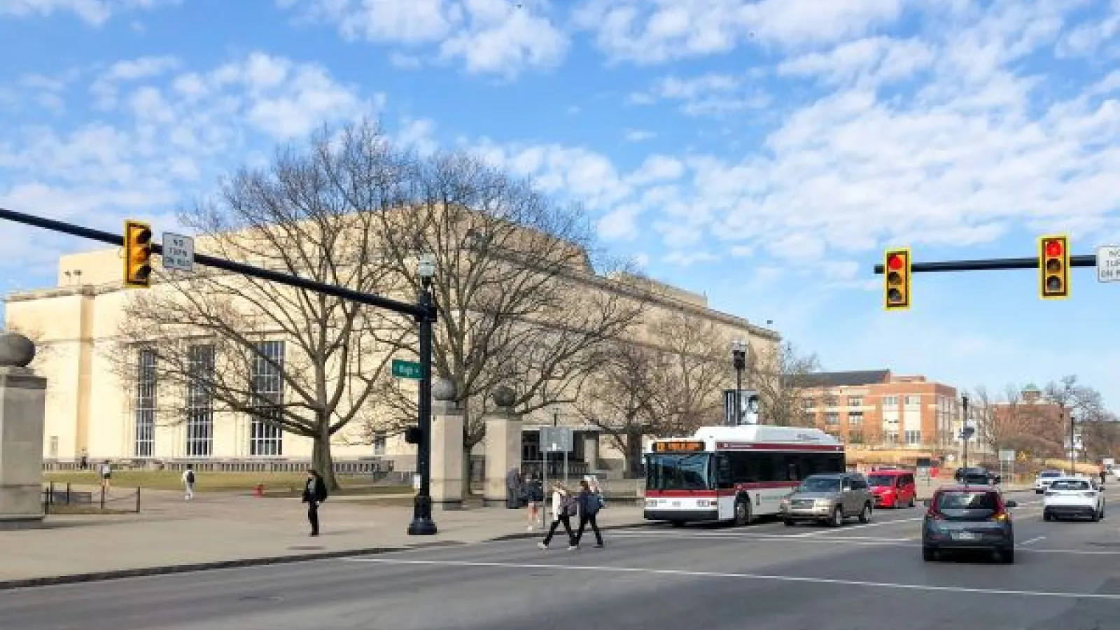a bus drives past the Wex on High Street