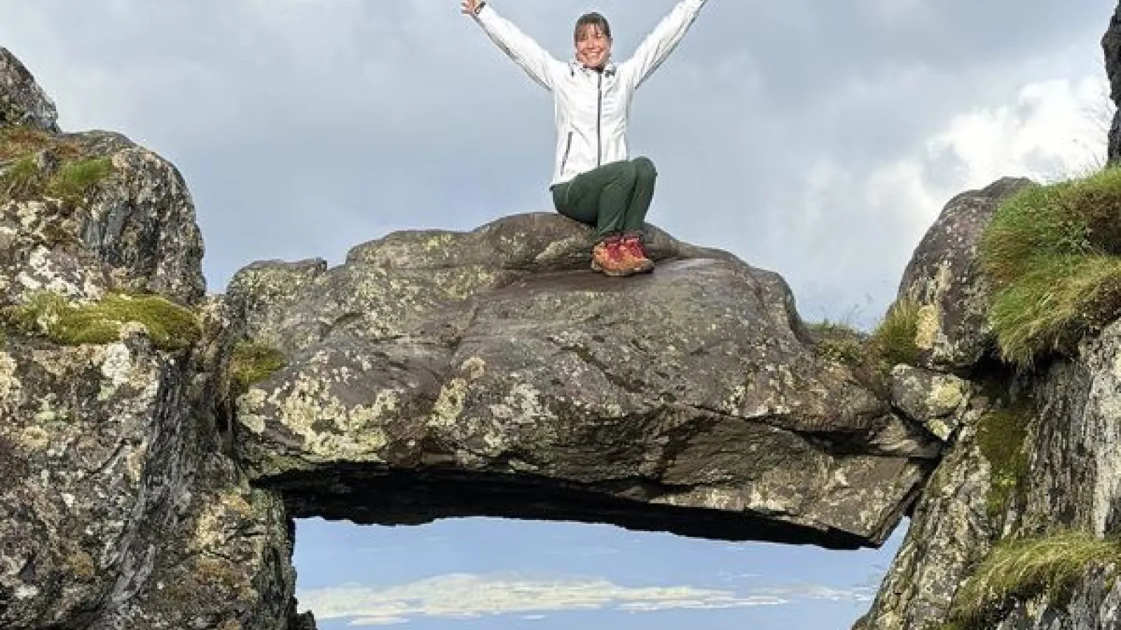 Erin Murray poses on a rock formation in Norway