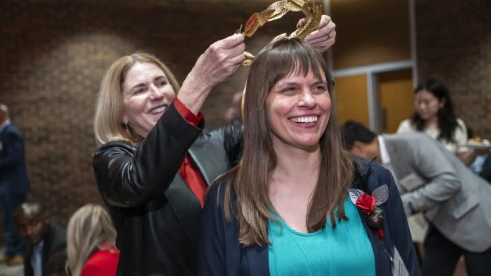 Kate Shannon receives the Artist Laureate crown at the 2025 Faculty Awards Celebration.
