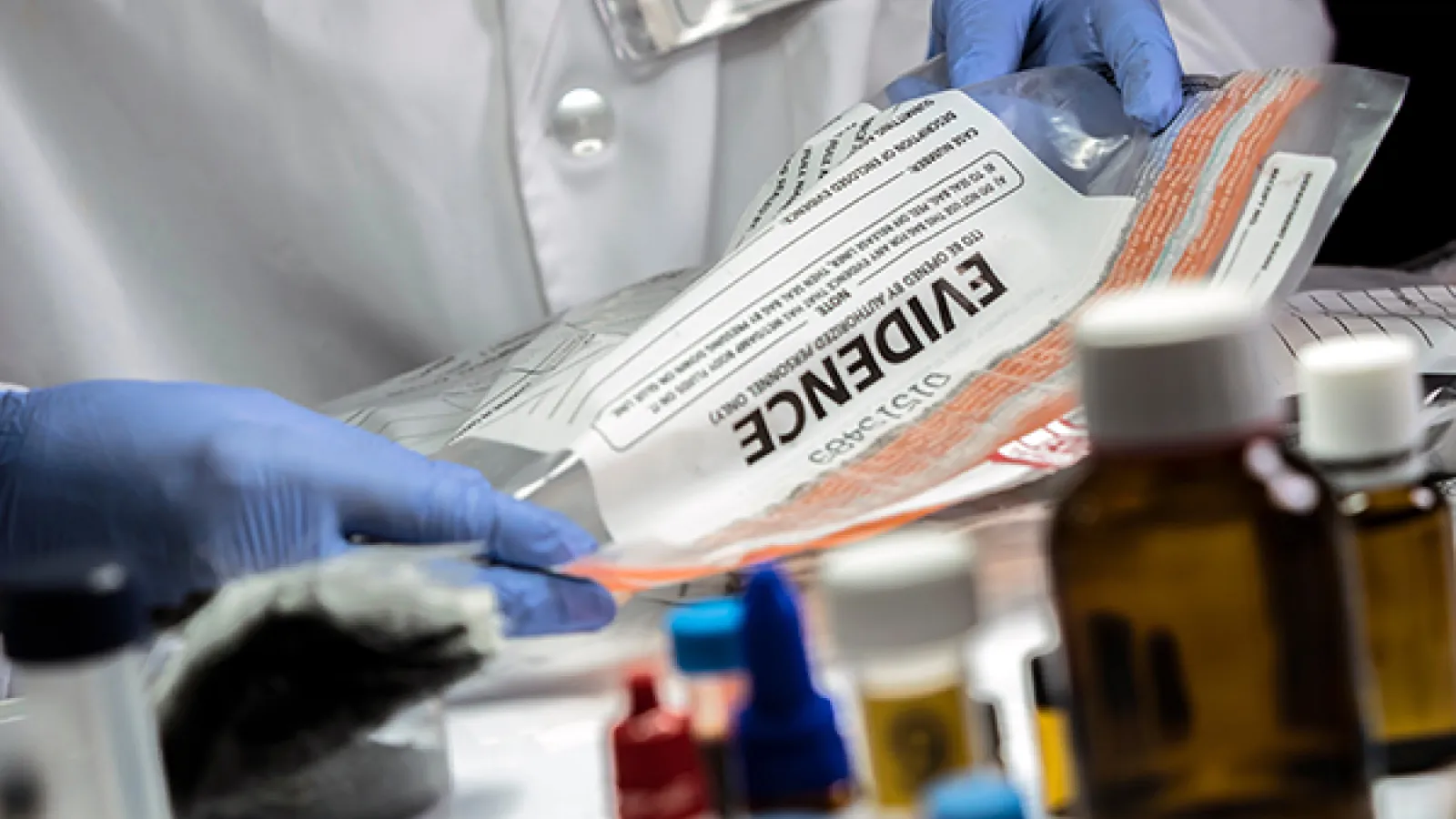 Evidence bag with evidence samples in a lab setting