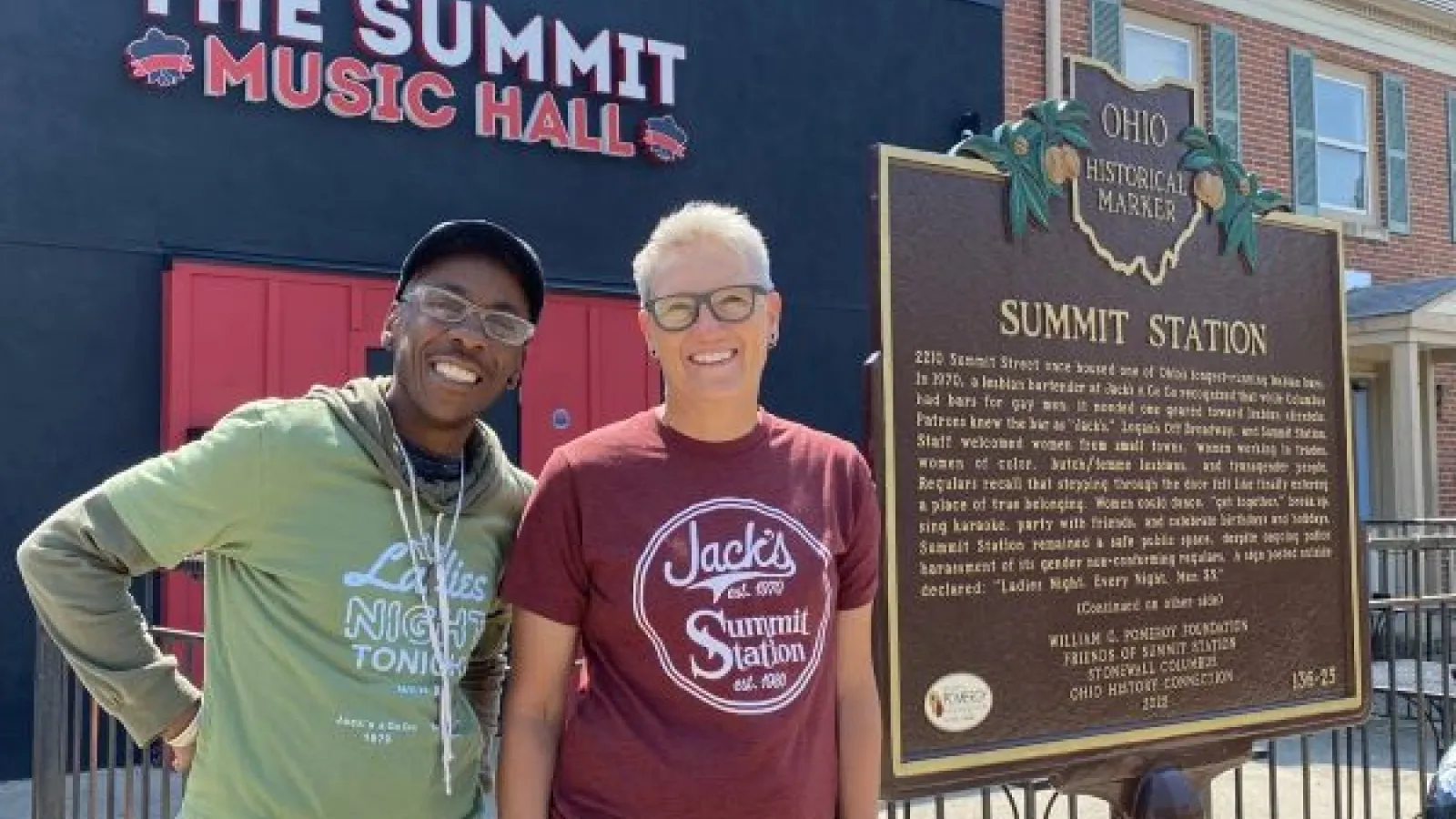 LuSter Singleton and Julia Applegate by the historical marker in front of Summit Music Hall