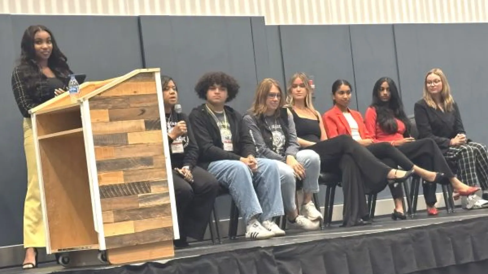 student speakers on stage