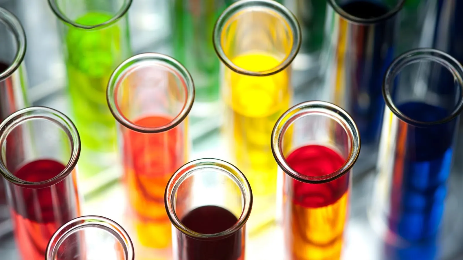 test tubes containing colorful liquids