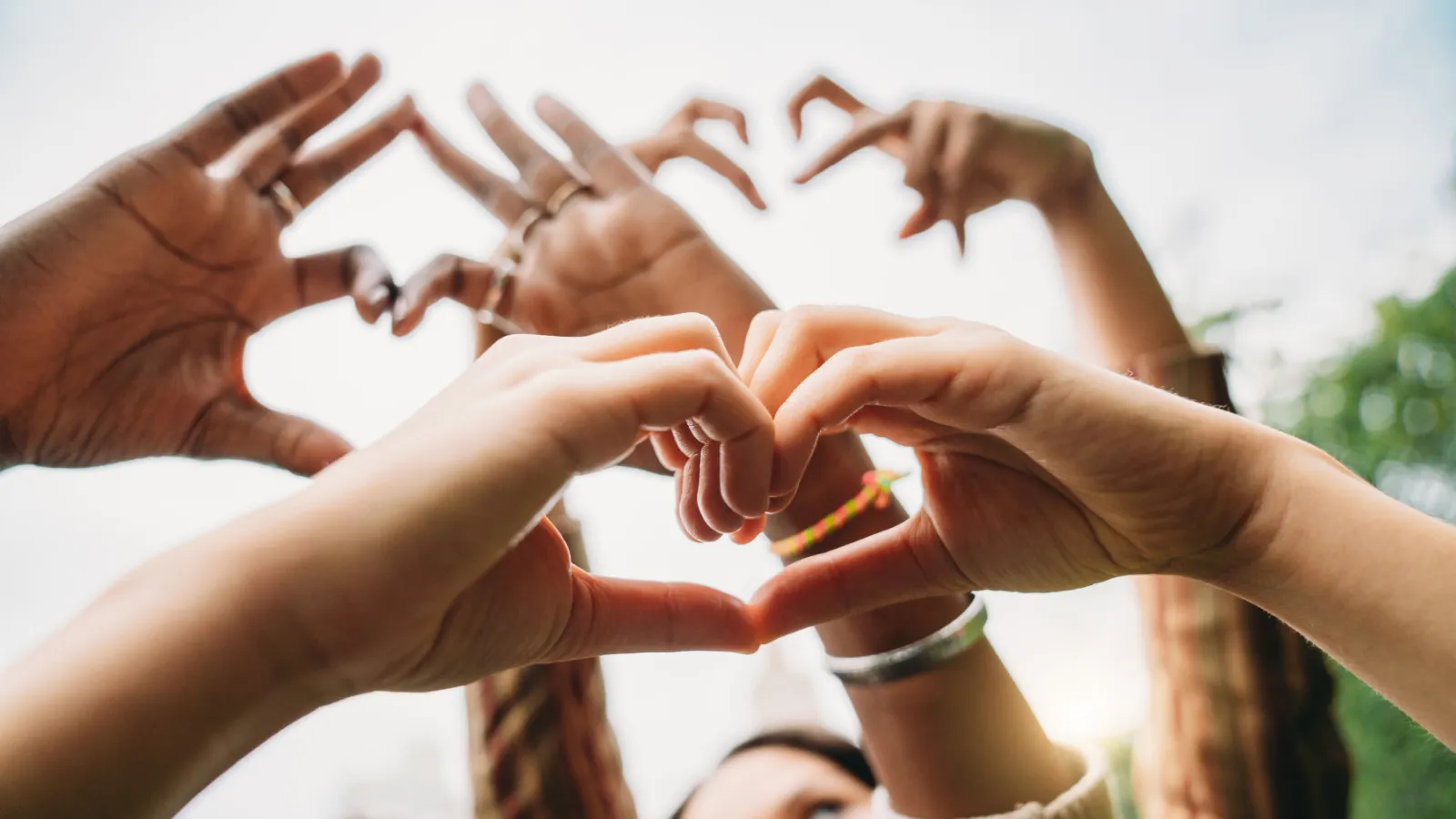 hands forming heart shapes