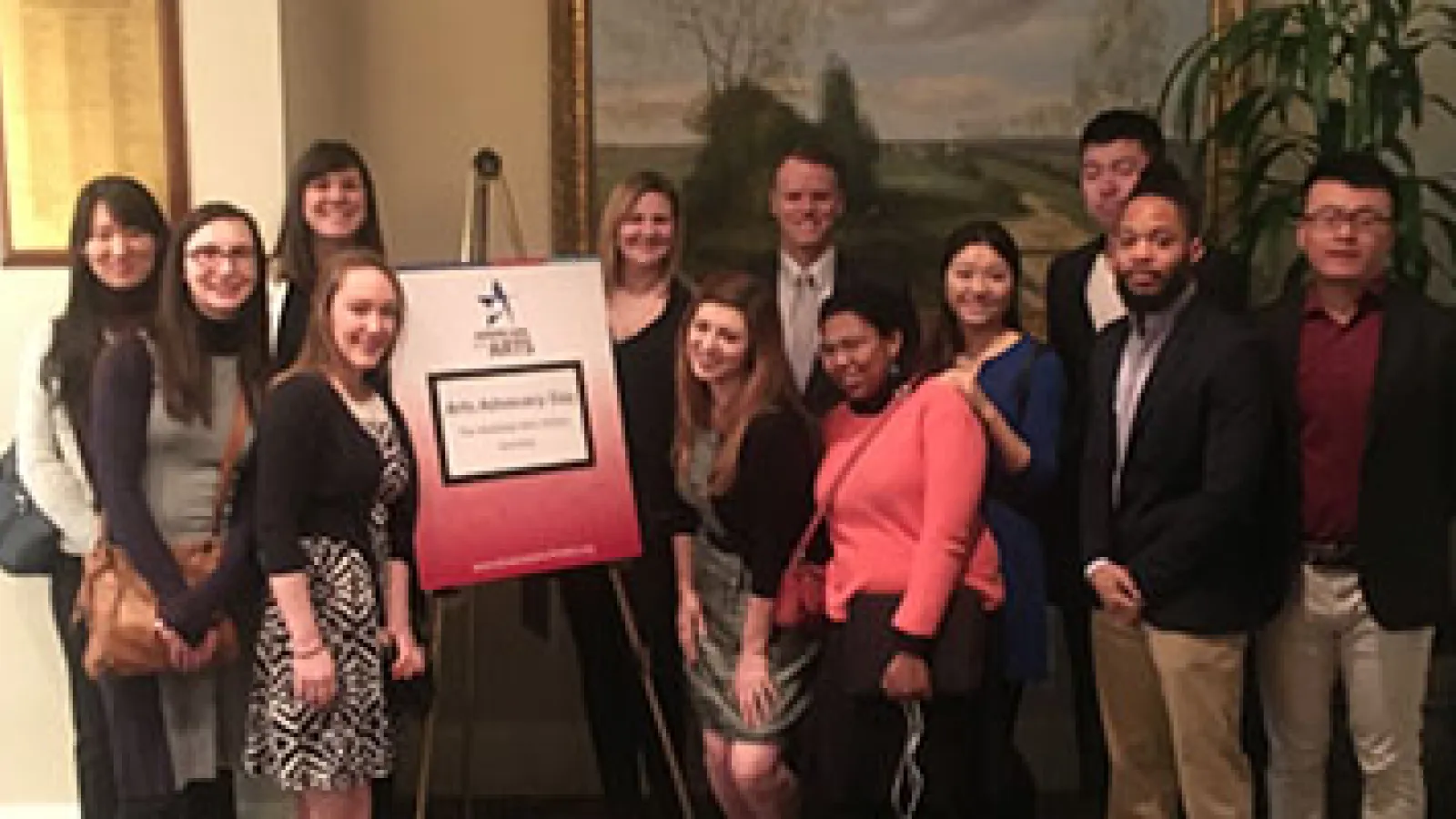 Ohio State graduate students with Arts Advocacy Day sign