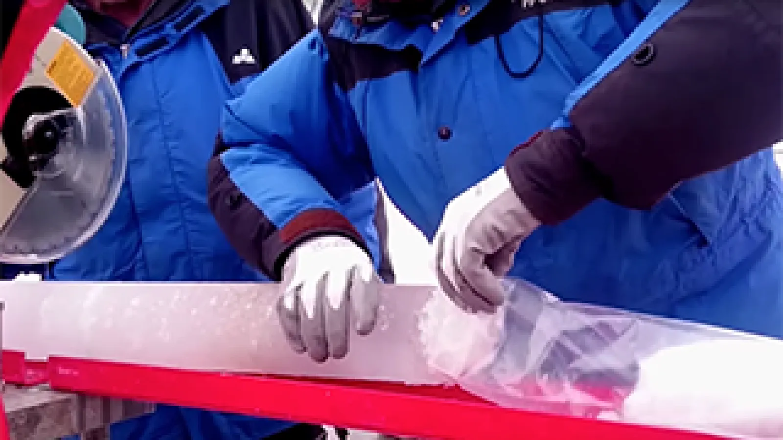 An ice core retrieved from the Guliya Ice Cap in the Kunlun Mountains in Tibet in 2015. Photo by Giuliano Bertagna, courtesy of the Byrd Polar and Climate Research Center.