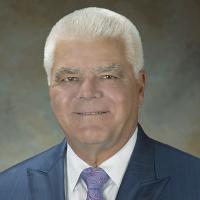 Gary Sharpe in a suit