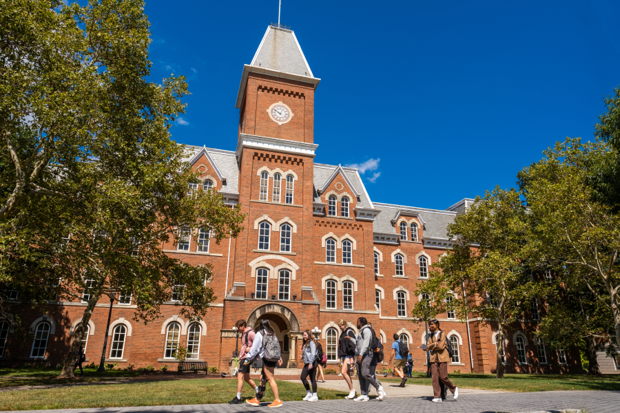 Students walking in front of University Hall