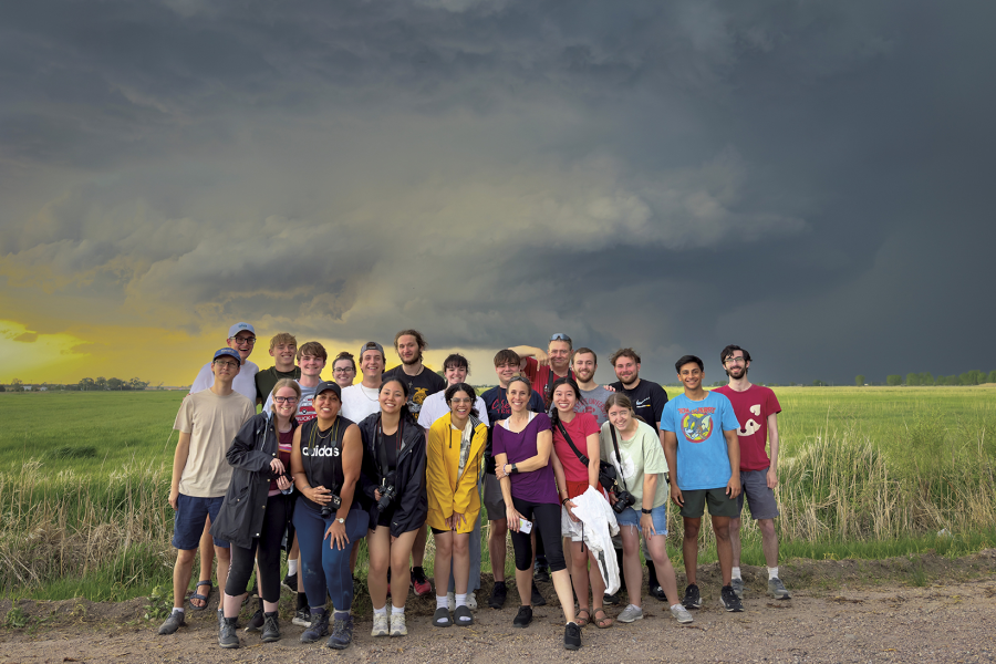 The spring 2025 GEOG 5701 cohort of students in front of a supercell near North Platte, Nebraska, on May 14, 2025.