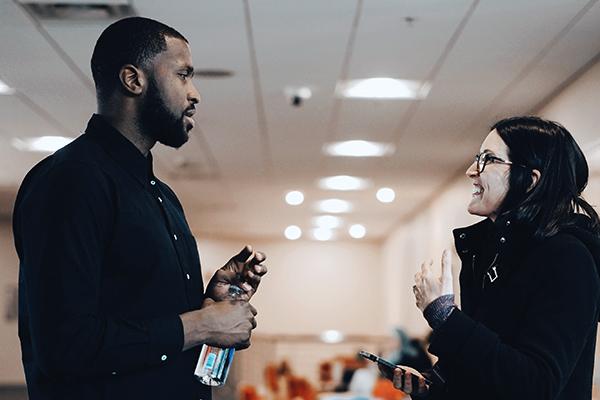 Michael Kidd-Gilchrist speaks to an Ohio State student