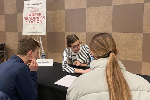 Students have mock interviews at a career readiness fair