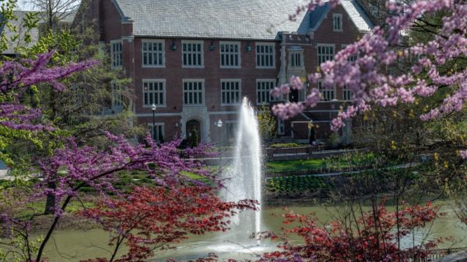 Pomerene Hall and Mirror Lake in spring