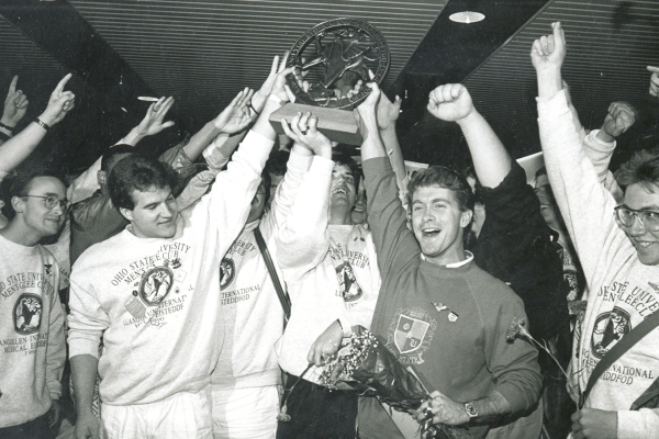 In 1990, the Men’s Glee Club competed at the Llangollen International Musical Eisteddfod where they won the male chorus division, then won the overall competition unanimously as voted by nine judges from eight different countries.
