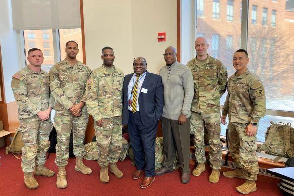 U.S. Army Reserve members with CAS Assistant Director Jacien Carr and Director Ousman Murzik Kobo.