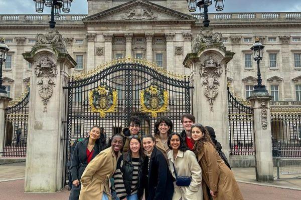a student group in front of Buckingham Palace