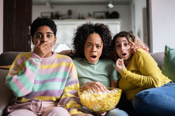 a group of teenagers watching a movie
