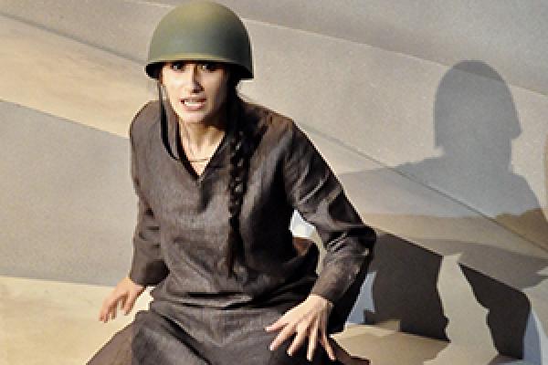 An actress performs in “Behind the Blast Wall” by Sonali Bhattacharyya, produced by Palindrome Productions, October 2017, London. Image by Manuela Chastelain.