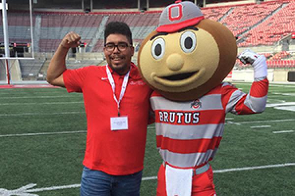 Deondre Smiles poses with Brutus Buckeye