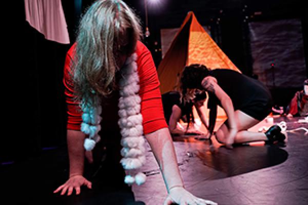 Norah Zuniga Shaw, a professor in the Department of Dance and the Advanced Computing Center for the Arts and Design, during a performance of Climate Gathering. Photo credit Heather Taylor.