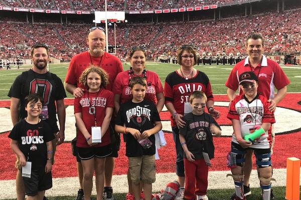 Special Spectators pose for a photo on the field