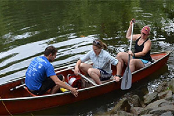 Corey Wallace; co-PI Rebecca Barnes; and Sawyer (middle), in a canoe during their first field season this past August. Corey Wallace; co-PI Rebecca Barnes; and Sawyer (middle), in a canoe during their first field season this past August.