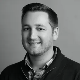 Zack Miesel headshot in black and white